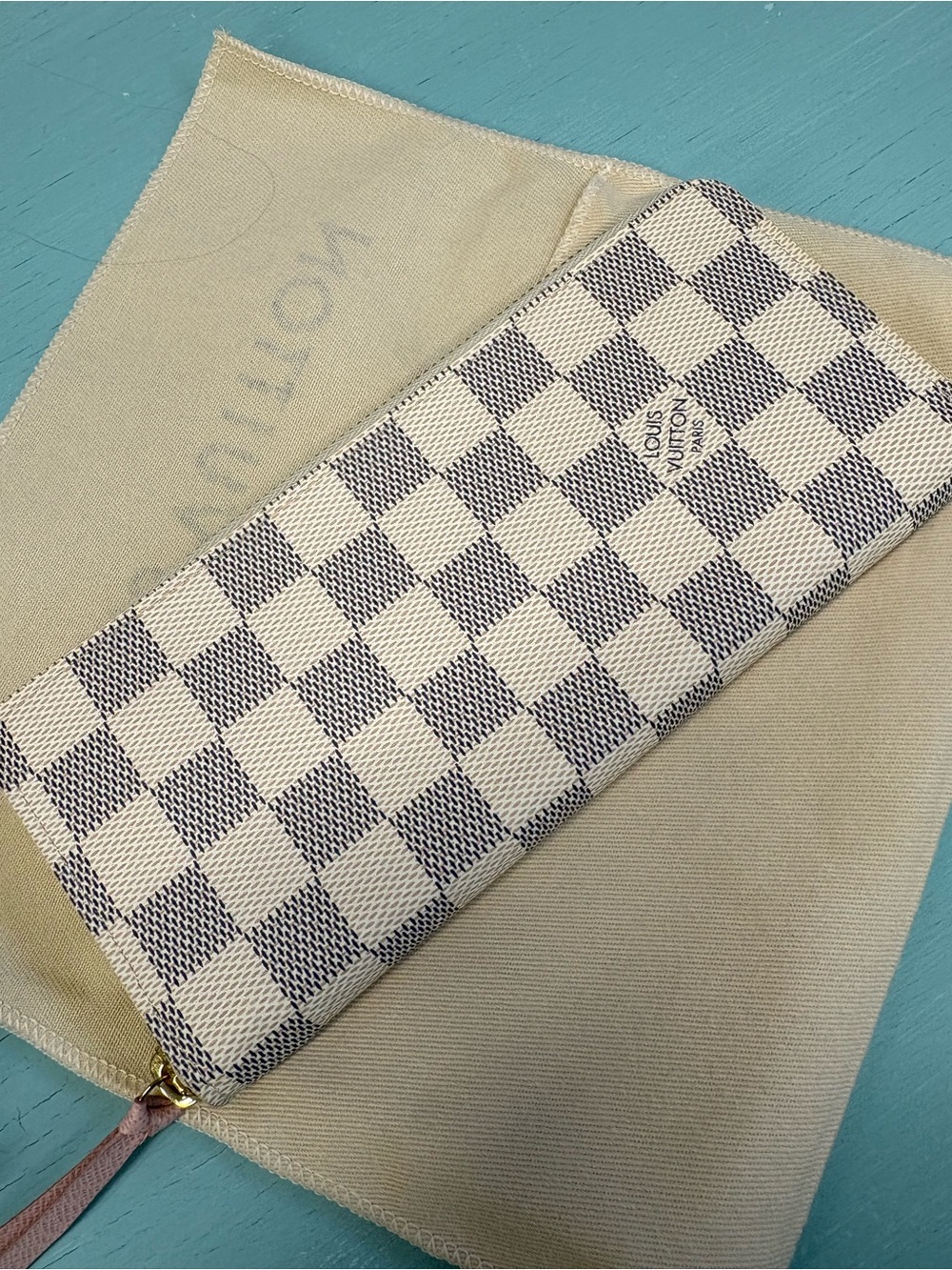 Louis Vuitton Full length zip around wallet in the damper Azur canvas. AUTHENTIC